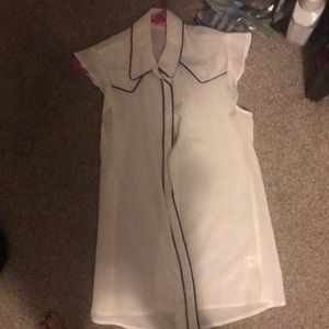 White button down blouse with black lining